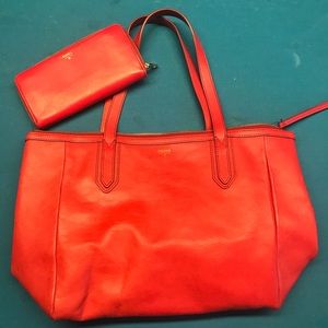 Red fossil wallet and matching purse.